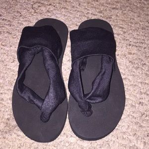 Black flip flops